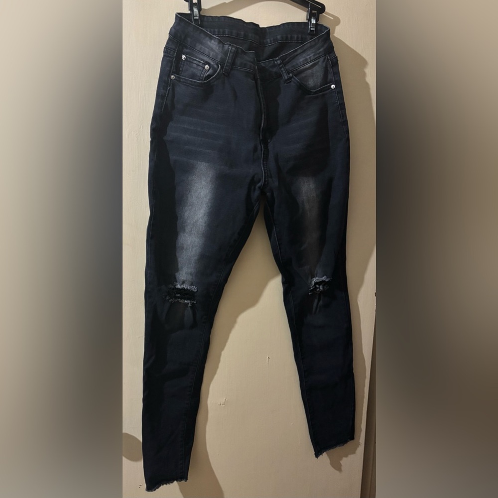 Ripped high rise jeans.